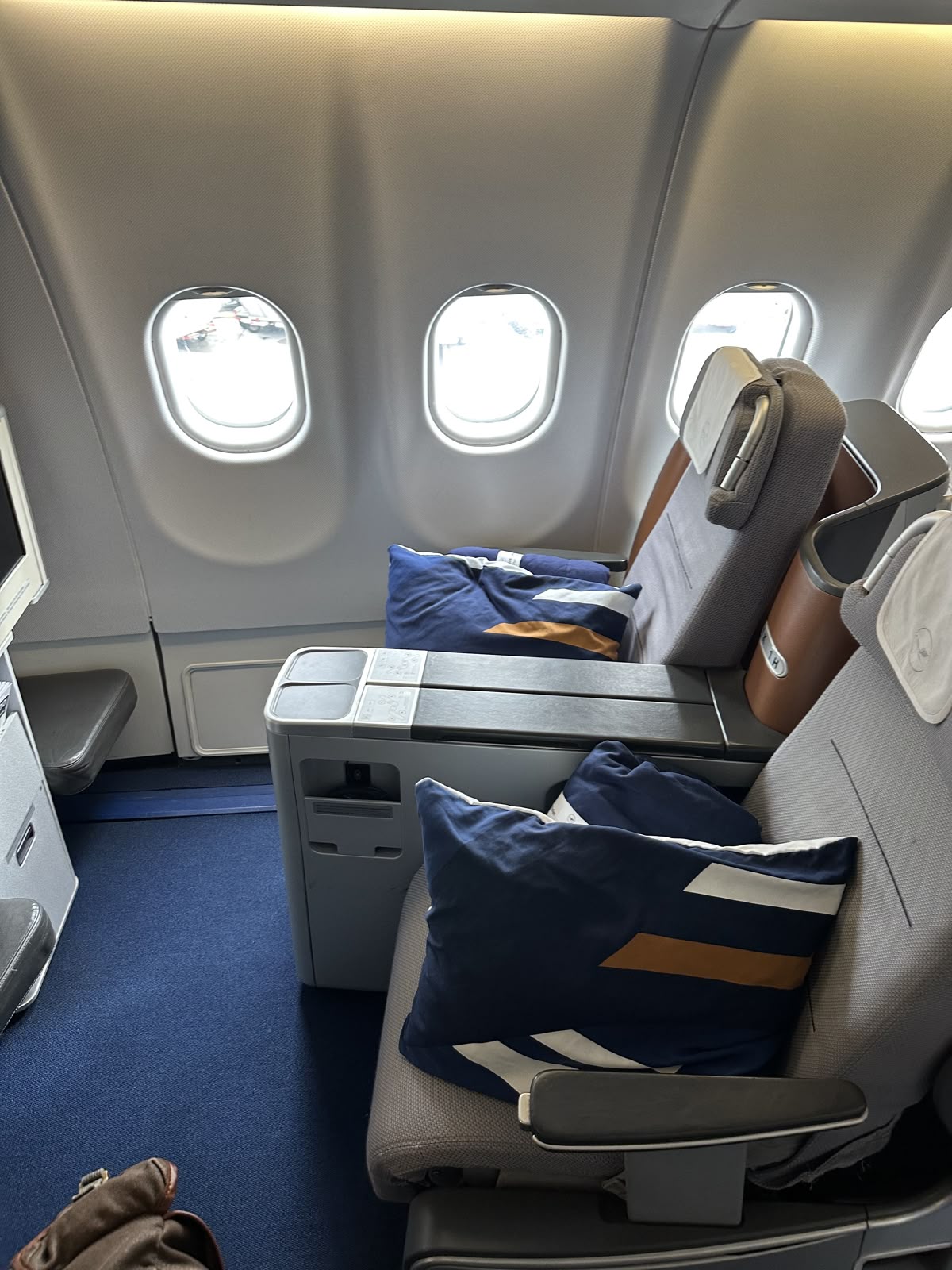 Lufthansa Allegris business class seat with privacy door on the Airbus A350